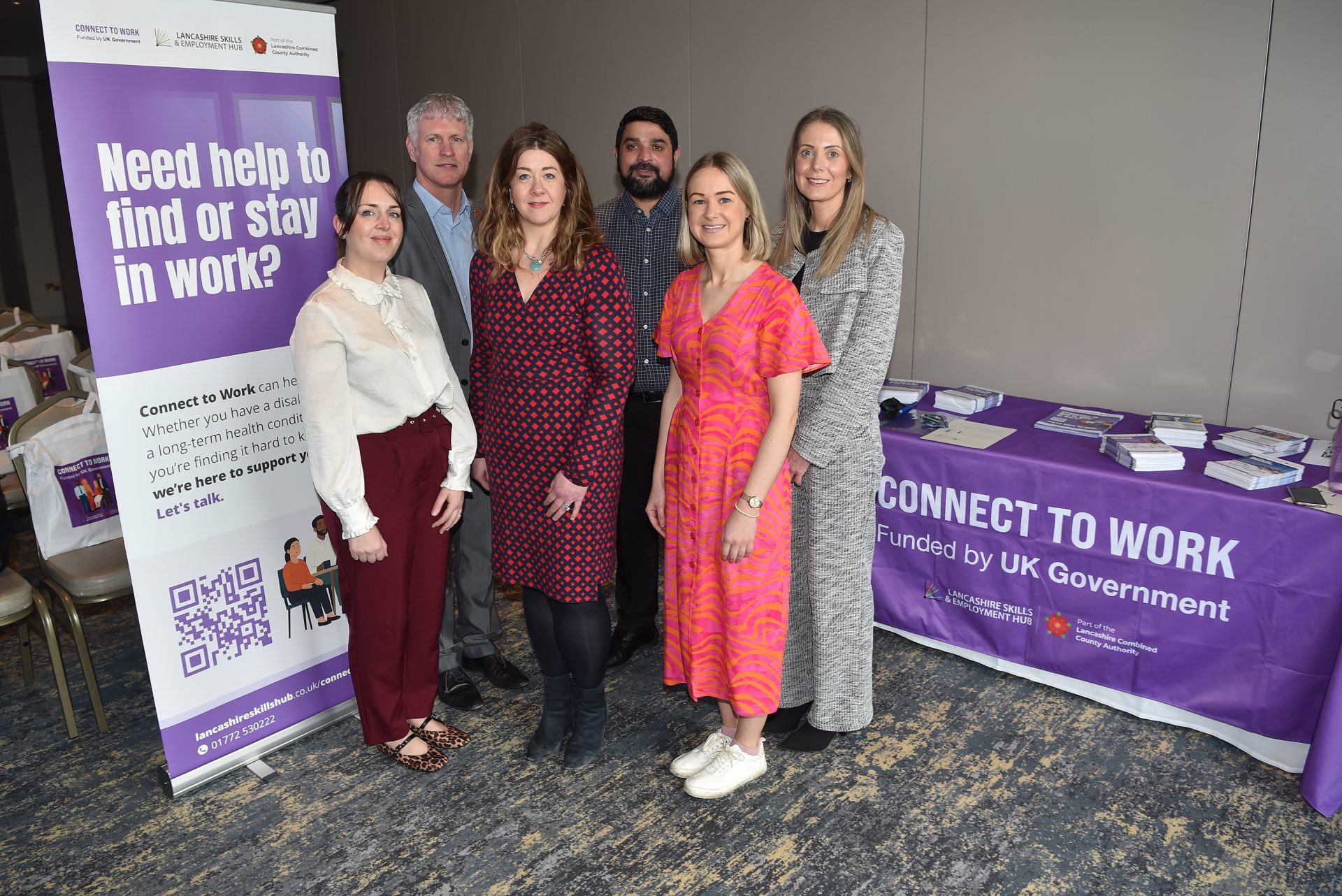 Photo of the Connect to Work delivery team from one of the launch events.